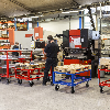 Palettenwagen in rot 650mm hoch ohne Bremse für Paletten 1200x1000mm