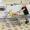Kongamek kleiner Edelstahl- Tischwagen rostfrei mit 2 Böden 495x515mm mit Umrandung und Bremse Kongamek kleiner Edelstahl- Tischwagen rostfrei mit 2 Böden 495x515mm mit Umrandung und Bremse