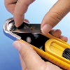 SK-8 - Cúter de seguridad con cuchilla trapezoidal de 18mm